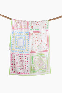 Patchwork print sand-free beach towel with multicolour panel design shown from the front